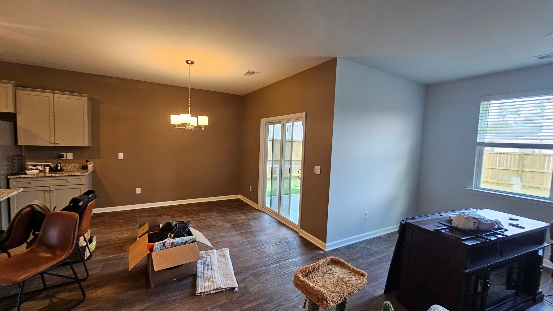 Interior wall repaint in warm mocha with accent dining area