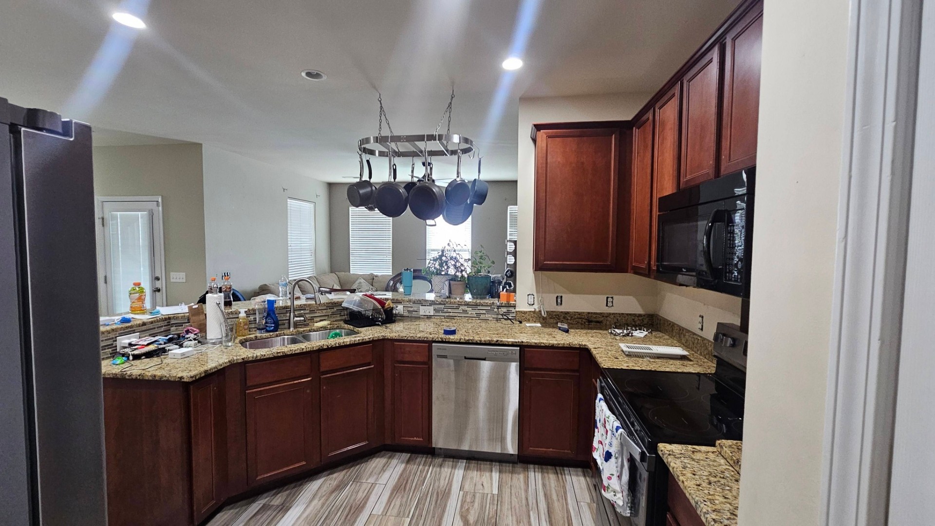 Kitchen before refinishing — original cherry cabinets